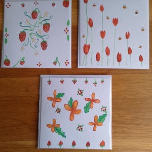 handgemalte Aquarellkarten (3er-Set) rote und orange Blumen und Erdbeeren