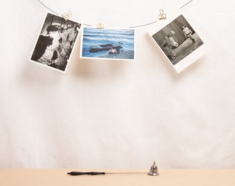 Slim Delicate Silver Candle Snuffer with Black Handle