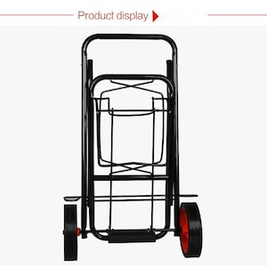May include: A black folding utility cart with two black wheels and a red center. The cart has a rectangular frame and a handle at the top. The words "Product display" are at the top of the image.