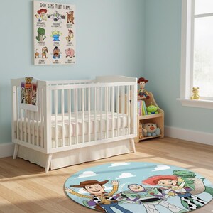 May include: A nursery scene featuring a white crib, a round rug with Toy Story characters, and a wooden bookshelf with toys. A framed print on the wall reads "GOD SAYS THAT I AM." The room has light blue walls and a window.