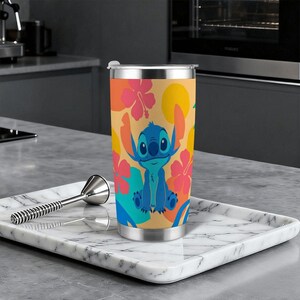 Disney Stitch 20oz Stainless Steel Tumbler, Lilo and Stitch Tropical Hibiscus Travel Mug, Hawaiian Blue Alien Insulated Cup with Straw image 3
