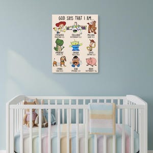 May include: A rectangular canvas print with the text "GOD SAYS THAT I AM..." and various character illustrations. The print features characters with words like "Empowered," "Treasured," and "Precious."