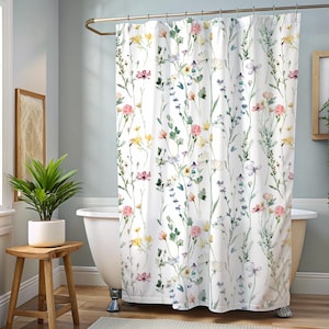 May include: White shower curtain with a watercolor floral pattern featuring pink, yellow, and blue flowers on green stems.