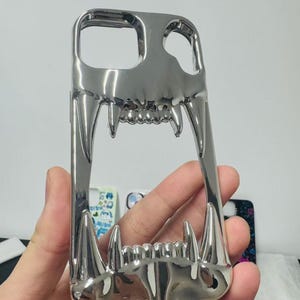 3D Hollow Fanged Skull iPhone Case – Metallic Silver & Black Creative Protective Cover for Gothic and Punk Style