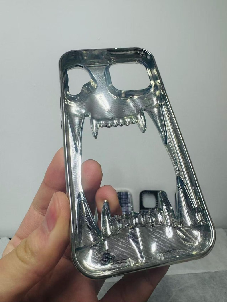 3D Hollow Fanged Skull iPhone Case – Metallic Silver & Black Creative Protective Cover for Gothic and Punk Style image 4