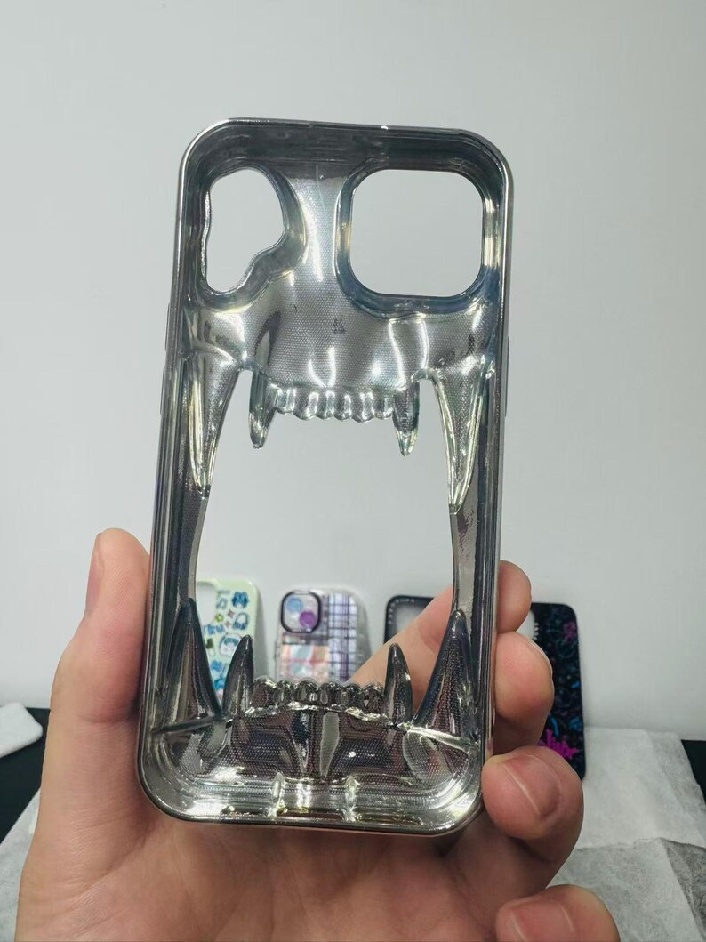 3D Hollow Fanged Skull iPhone Case – Metallic Silver & Black Creative Protective Cover for Gothic and Punk Style image 6