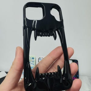 3D Hollow Fanged Skull iPhone Case – Metallic Silver & Black Creative Protective Cover for Gothic and Punk Style image 2