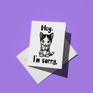 Biglietto di scuse a forma di gattino, simpatico biglietto di auguri per gli amici con scritta "Mi dispiace, mi dispiace!" e messaggio carino a forma di gatto.