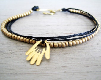 Black Bracelet and 24k Gold plated Hamsa Hand Charm