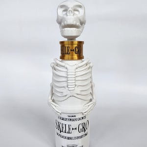 Skeleton Bone Growing Potion Bottle - Inspired by the adventures of a wizard - WARM WHITE
