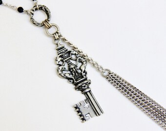 Reclaimed extra long Griffin Bacchus medieval themed skeleton key charm silver chain tassel beaded necklace recycled jewelry gift for women