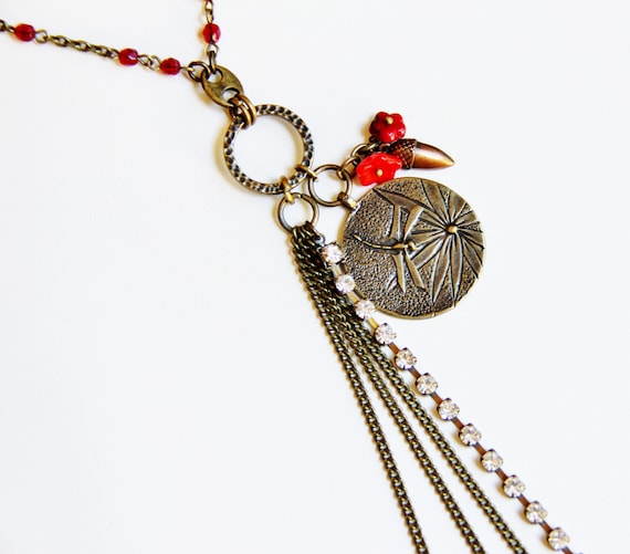 Brass Charm & Tassel Beaded Necklace Brass Charm & Tassel Beaded Necklace
