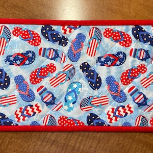 Quilted toilet tank topper, red white and blue flip flops, small table topper