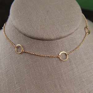 Tiny gold linked circles and 14 karat gold filled necklace, tiny circles necklace, infinity necklace, simple gold necklace, gold ring