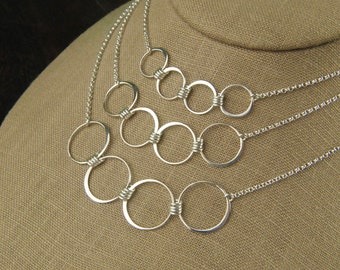 Sterling Silver Four Circle Necklace: Interlocking Ring Pendant