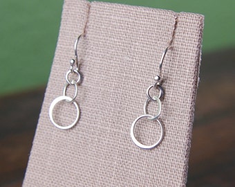 Tiny three linked circles earrings in sterling silver, entwined circles, circle drop earrings, interlocking rings, hoop earrings