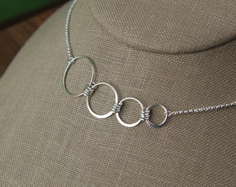 Graduated four circle infinity necklace in sterling silver, entwined rings, interlocking circles, four circles mother's day