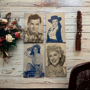 レトロなアーケード展示カードのセット。1950 年代のヴィヴィアン・オースティン、ノリーン・ナッシュ、マリー・マクドナルド、コーネル・ワイルド。映画スター、女優、俳優