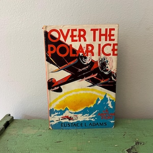 1928 Over The Polar Ice. Antique Adventure Book by Eustace Adams. An Andy Lane Story 1st Edition, HC/ DJ Vintage Book Plane Airplane