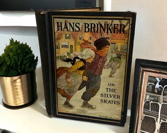 1925 Hans Brinker or The Silver Skates Vintage Book by Mary Mapes Dodge. Illustrated by Ruth Hilpert. John Winston Publishing