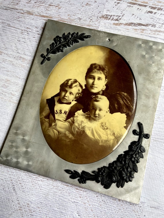 1890's Celluloid Button Portrait in Metal Frame With Floral Embellishments.  Mother With Children. US Navy. Convex Celluloid Photograph 
