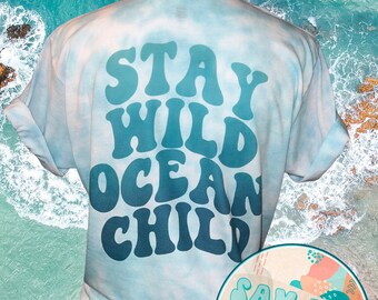 Stay Wild Ocean Child Retro Hand Dyed Graphic T-Shirt / Vintage Sublimation design / Summer Sunshine Beach Vacation Ocean Waves Front Pocket