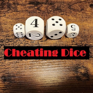 May include: Four white dice of varying sizes arranged in a row. Two dice feature black pips, while the two larger central dice feature black printed numbers. Below the dice, a black rectangular banner displays the red text Cheating Dice.