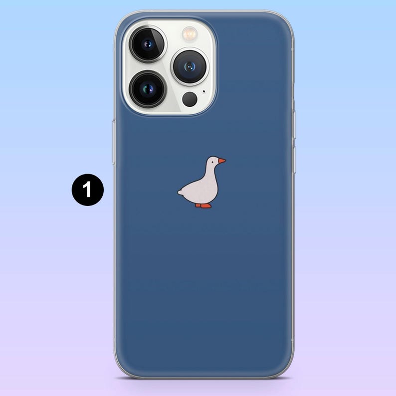May include: A navy blue phone case with a cartoon goose design. The white goose has orange feet and a red beak. The case has a clear border and is designed for a smartphone with multiple camera lenses.