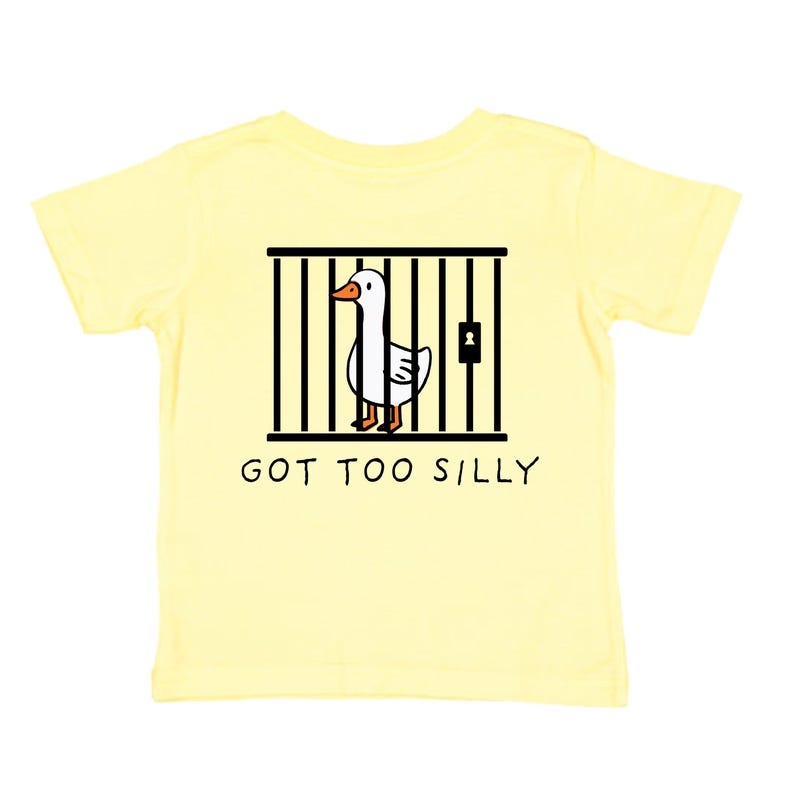 May include: A yellow short-sleeved t-shirt with a cartoon goose in a cage on the back. The text "GOT TOO SILLY" is printed below the image.