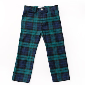 May include: Blue, black, and teal plaid pants. The pants have a button and zipper closure, belt loops, and pockets. The plaid pattern is a classic design, suitable for various occasions.