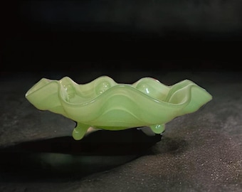 Fenton Jadeite wide rim footed bowl with scalloped rim.