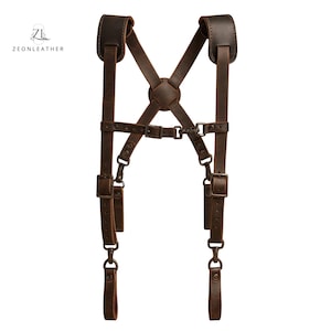 Dark brown leather suspenders for tool belt, adjustable gallows-style straps with brass hardware for comfort and durability