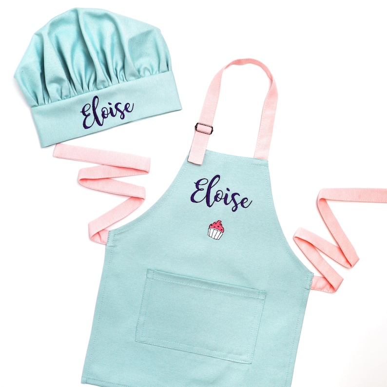 Cute personalized kids apron and chef hat set with custom embroidered name. Mint apron for cooking and baking