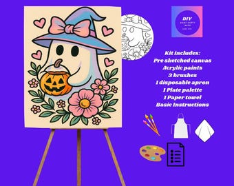 May include: A Halloween-themed DIY paint kit. The pre-sketched canvas features a cartoon ghost wearing a witch hat and holding a jack-o'-lantern. The kit includes acrylic paints, brushes, an apron, a palette, a paper towel, and instructions.