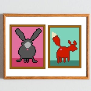 May include: Two framed pixel art images, one of a gray rabbit with pink ears and nose, and the other of a red fox with a white tail tip, both on a white background.
