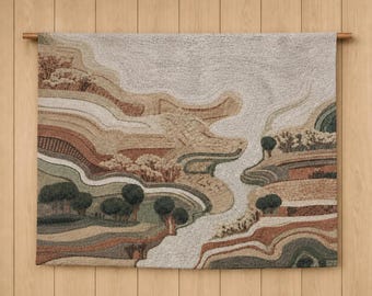 May include: A rectangular wall hanging featuring a textured, tufted landscape design in shades of beige, cream, terracotta, sage green, and dark brown. The abstract pattern depicts rolling hills, layered fields, and small clusters of trees.