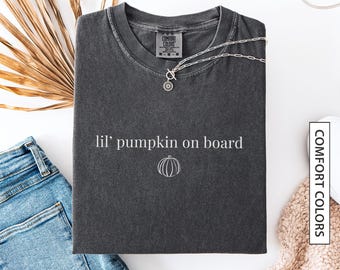 Camiseta de revelación de bebé para futura mamá. Camiseta de embarazo con temática de calabaza, otoño y Halloween para futura mamá. Camiseta de colores cómodos.
