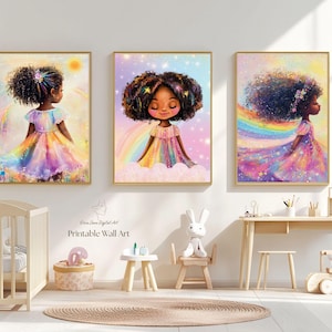May include: Three framed wall art prints featuring illustrations of a young person with dark curly hair wearing a rainbow-colored dress. The artwork displays vibrant pastel colors, rainbows, stars, and clouds, with the text Erica Jane Digital Art.
