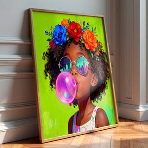 May include: A framed art print featuring a portrait of a person with curly hair wearing a floral crown of blue, red, and orange flowers. The person wears round sunglasses reflecting a city skyline and blows a large, bright pink bubblegum bubble.