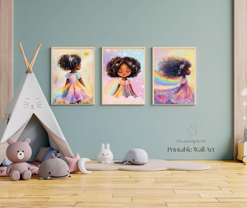 May include: Three framed wall art prints featuring a young girl with dark curly hair in a rainbow-colored dress. The illustrations include elements like rainbows, stars, and soft clouds. The text "Erica Jane Digital Art Printable Wall Art" is visible.
