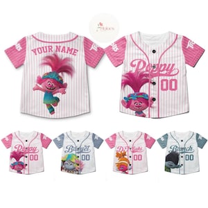 May include: Five pink, blue, and gray baseball jerseys with Trolls characters. The jerseys have white stripes and the characters are Poppy, Bridget, DJ Suki, and Branch. The jerseys have the character's name and the number 00 on the front.
