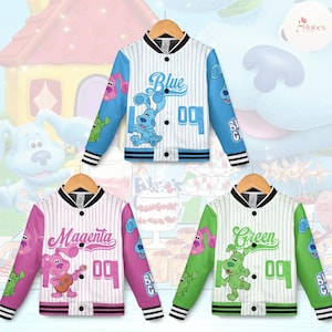 May include: Three letterman-style jackets in blue, magenta, and green, each featuring a cartoon character. The jackets have white bodies with vertical stripes, black collars, and matching cuffs. Each jacket displays a character's name and the number "09".