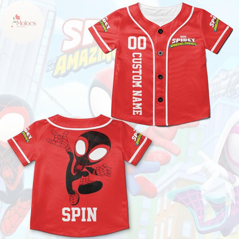 May include: Red baseball jersey with white trim and buttons. The front of the jersey has the text "SPIDEY AMAZING FRIENDS" and the number "00" with the text "CUSTOM NAME" below. The back of the jersey has a cartoon image of Spider-Man and the word "SPIN".