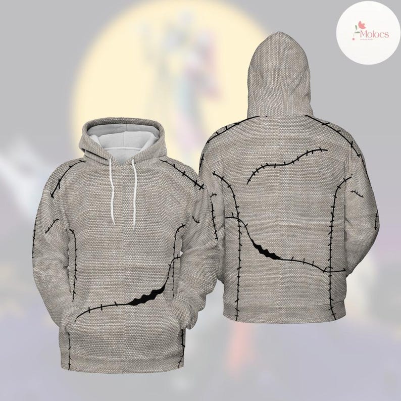 Puede incluir: Una sudadera con capucha gris claro con apariencia de tela texturizada. El dise&ntilde;o presenta detalles de costura negros y un bolsillo grande en la parte delantera. La sudadera tiene una capucha con cord&oacute;n y un interior blanco.