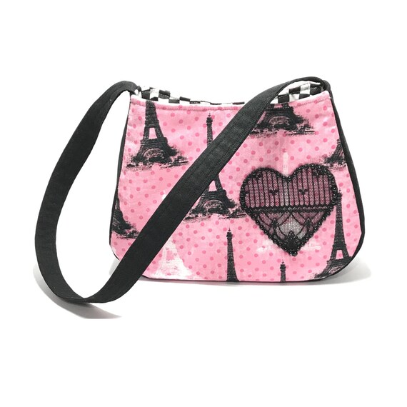 pink and black purse
