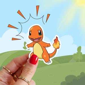 May include: A cartoon illustration of a bright orange and yellow Pokemon character with a flame tail. The character is standing on a green grassy field with a blue sky in the background.