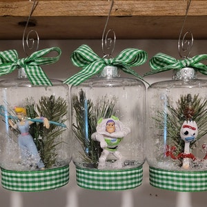 Toy Story Woody Buzz Light Year Bo Peep Forky Rex set 5 Christmas Tree Ornaments Character Snow Globe Green White Gingham Ribbon