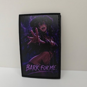 May include: A rectangular patch with a black border featuring a dark-haired anime character with glowing purple eyes and a reaching hand. The background is a deep purple and black swirl. The text BARK FOR ME is printed in purple at the bottom.