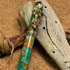 Luxury Sea Turtle Pen Ocean Inspired Rollerball with Fire Opal Accent a Nautical Gift for Beach Lovers features 24K Gold Trim Acrylic Body
