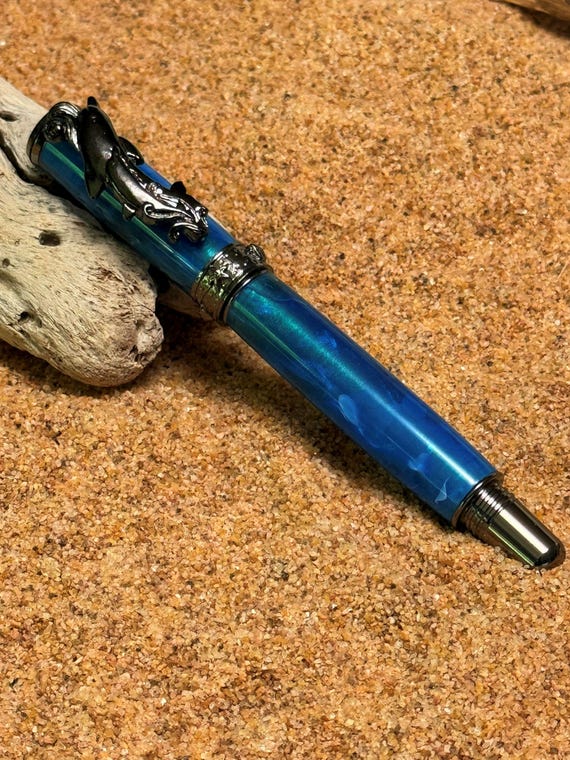 Dolphin Rollerball Pen Handmade Sea Life Themed Gift for Summer Vibes Black Titanium and Gold Trim with Ocean Mist Acrylic Body